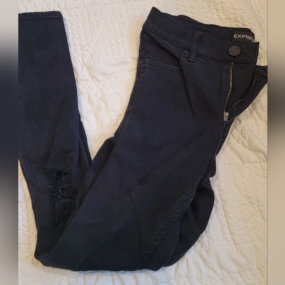 Womens express jeans ripped in both knees size 6s